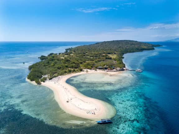 Snorkelling in clear water near Menjangan Island