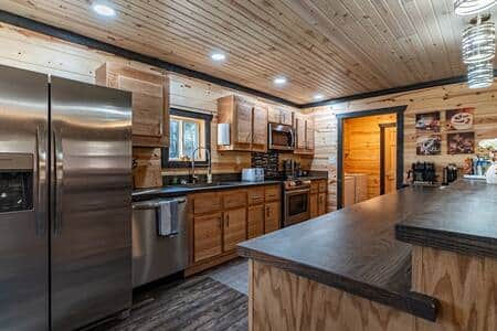 The kitchen is fully stocked with cooking, baking and grilling supplies