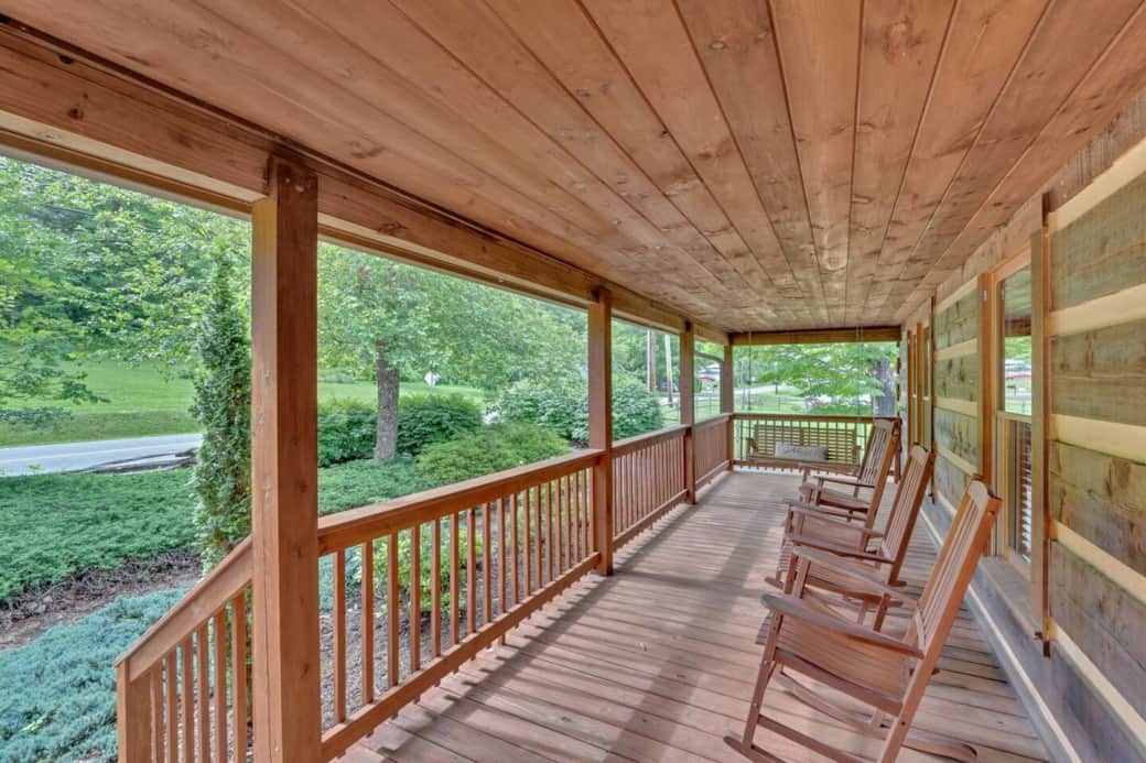 Sip your morning coffee on the spacious covered porch, complete with rocking chairs and a charming swing. Sip your morning coffee on the spacious covered porch, complete with rocking chairs and a charming swing.