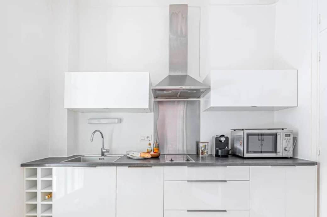 Fully equipped kitchen with access to the balcony Fully equipped kitchen with access to the balcony