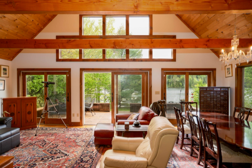 Warm, modern-rustic living with peaceful waterfront views