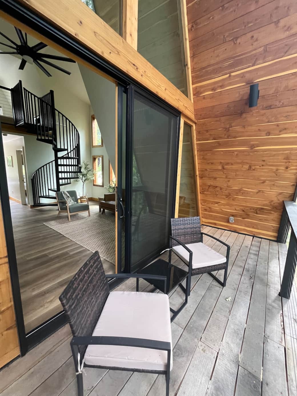 A small deck offers the perfect opportunity to sit and enjoy the peace and serenity of Remotely Rogers.