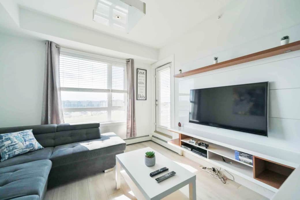 This bright and open area is the perfect place to relax while travelling. Kick back on the couch and enjoy the views out the window, as well as the 50” flat screen. The private covered balcony is also just steps away from the living room sectional.