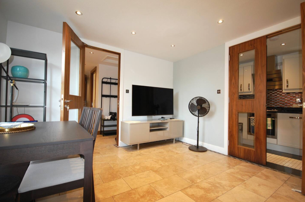 Living Room seen from sofa side aspect. Access to kitchen and main hallway from living room.