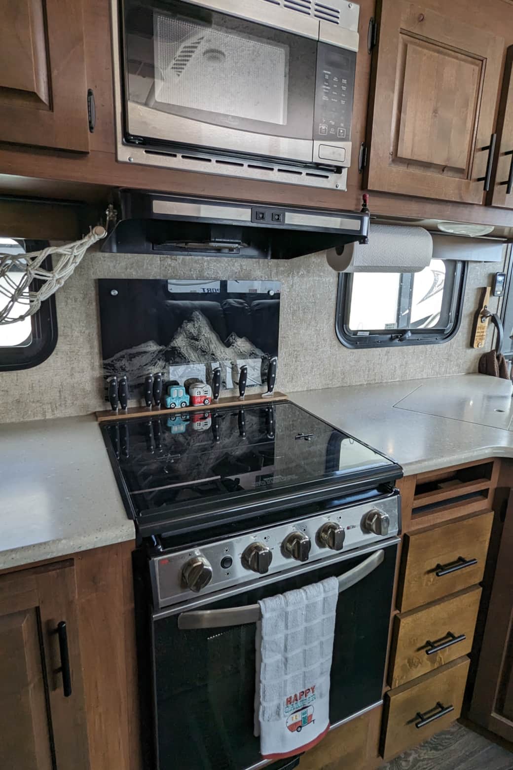 3-burner stove with folding cover for more counter space 3-burner stove with folding cover for more counter space