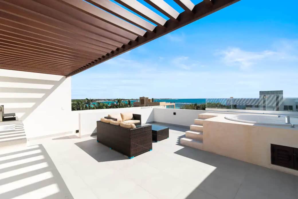 Private terrace with luxurious jacuzzi, stunning Caribbean Sea views. Relaxation redefined.