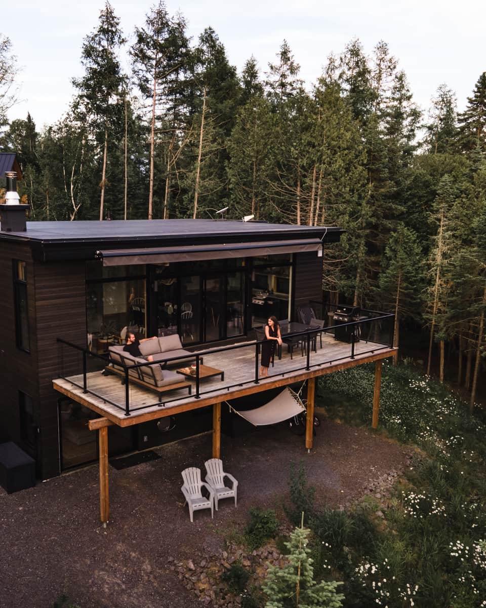 A huge deck with comfortable outdoor furniture