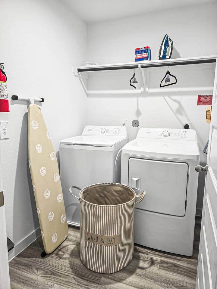 Washer and dryer located centrally upstairs in its own room. There is a ire extinguisher and first aid kit for safety needs. Hang your clothes to dry with complimentary hangers. Iron and an ironing board are available in the room as well. 