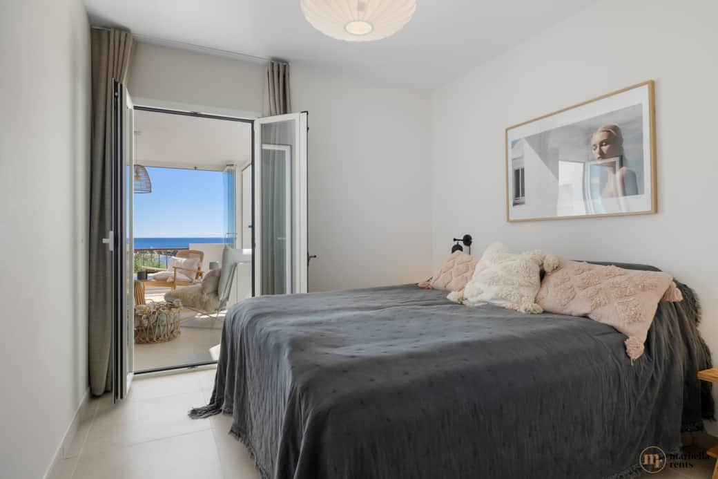 Comfortable bedroom with a view.
