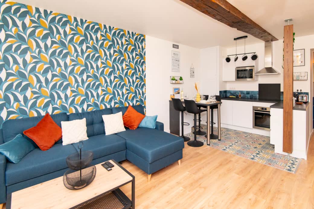 Salon et coin repas appartement Sedan
