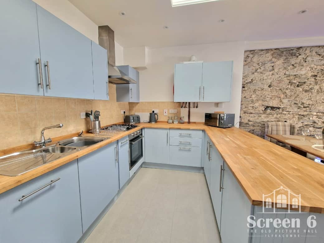 Dish washer, oven, hob, hood, microwave and a fridge