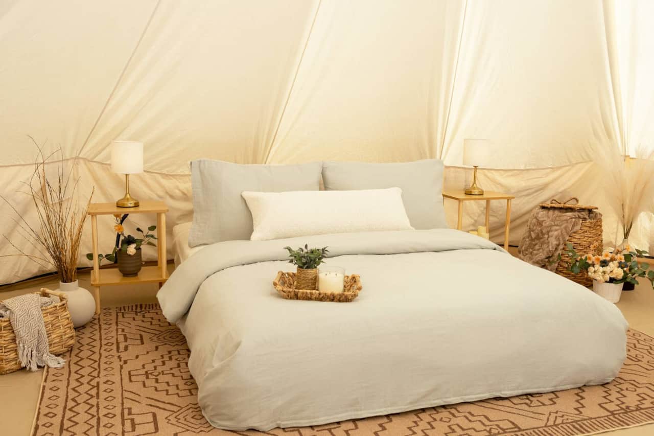 A Peaceful Queen Bed with Soft, Nature-Inspired Linens