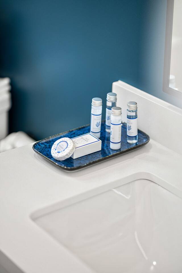 Indulge in thoughtful bathroom amenities designed for convenience and comfort.