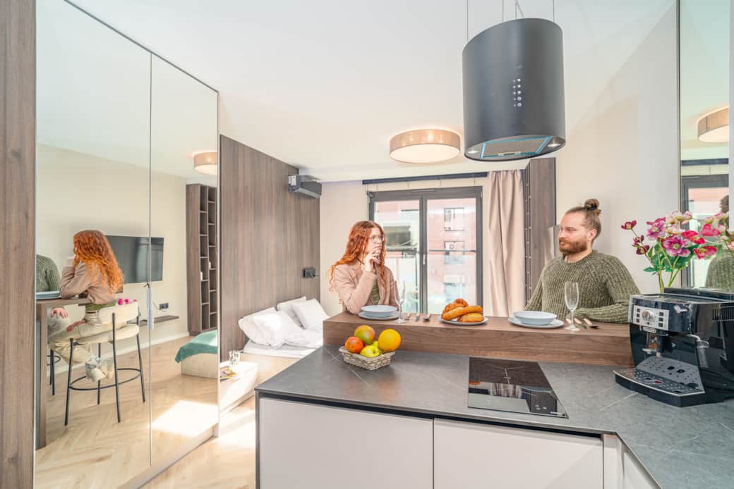 Functional kitchen with full cabinetry and elegant finishes.