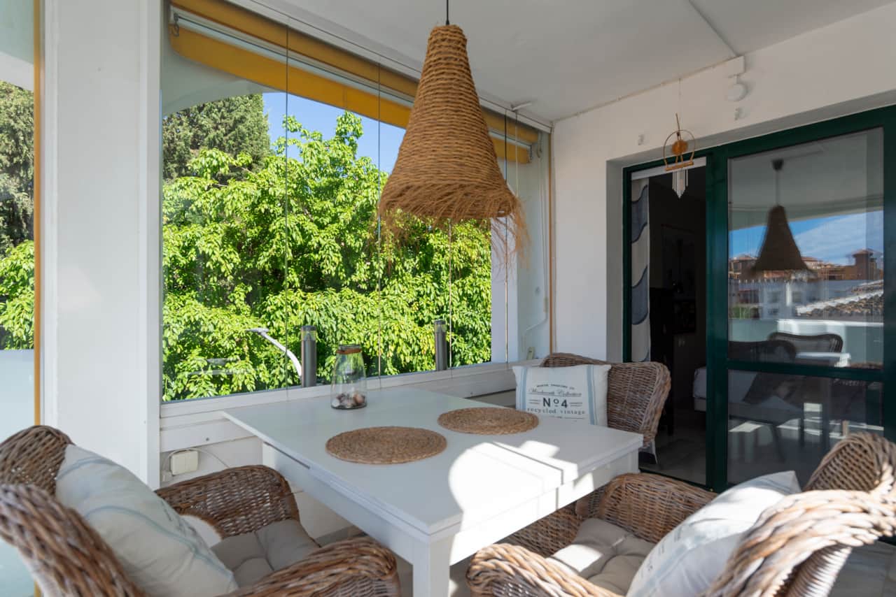 Bright terrace surrounded by greenery