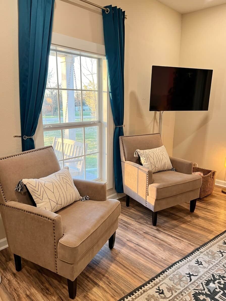 Full size chairs with a lovely view out the front porch. Full size chairs with a lovely view out the front porch.