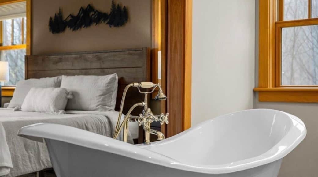 Relax in the spa-like soaking tub with serene mountain views just beyond—your own private retreat.