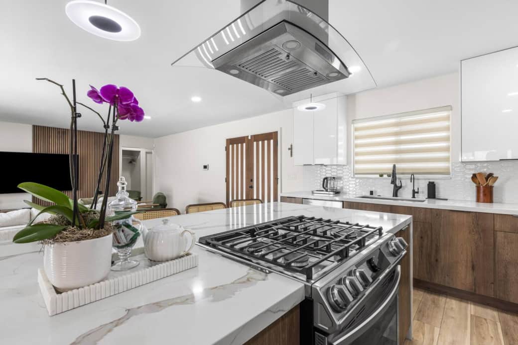 Cook with ease using the gas range and spacious island while enjoying views of the open living area.