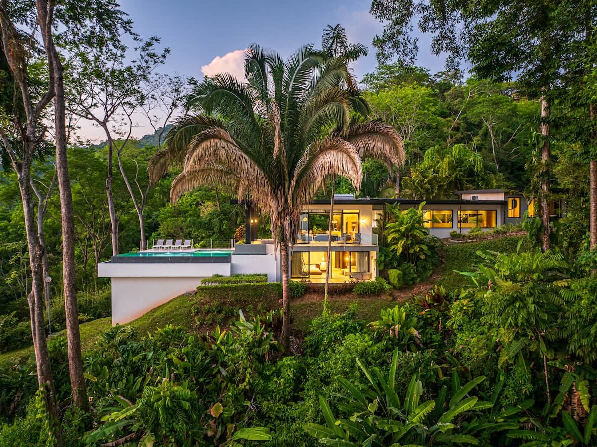 Exterior view of Casa Cosara Grande and the infinity pool  from the jungle. 