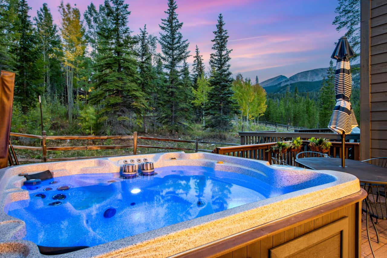 Private Hot Tub on quiet deck.  Ski in/out, winter shuttle to Peak 9, On Trails.