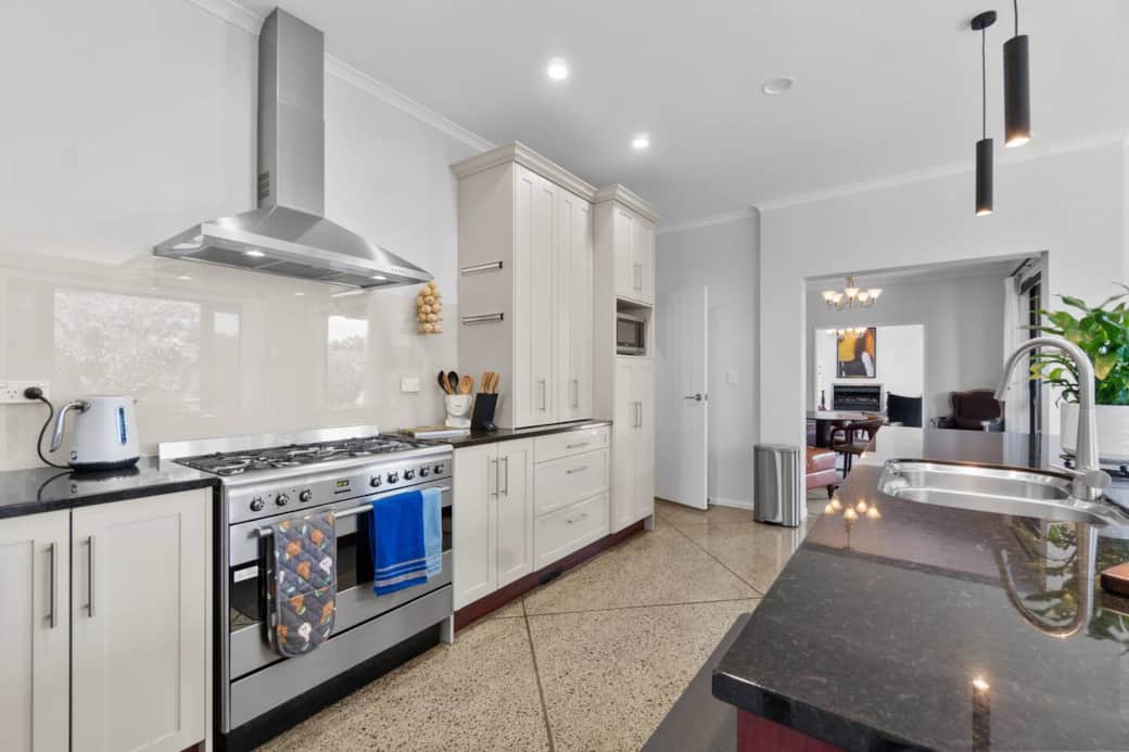 French Style kitchen with everything you need for a short or long stay including rice cooker, air fryer, sandwich press, toaster, kettle, baking trays and numerous cooking essentials.