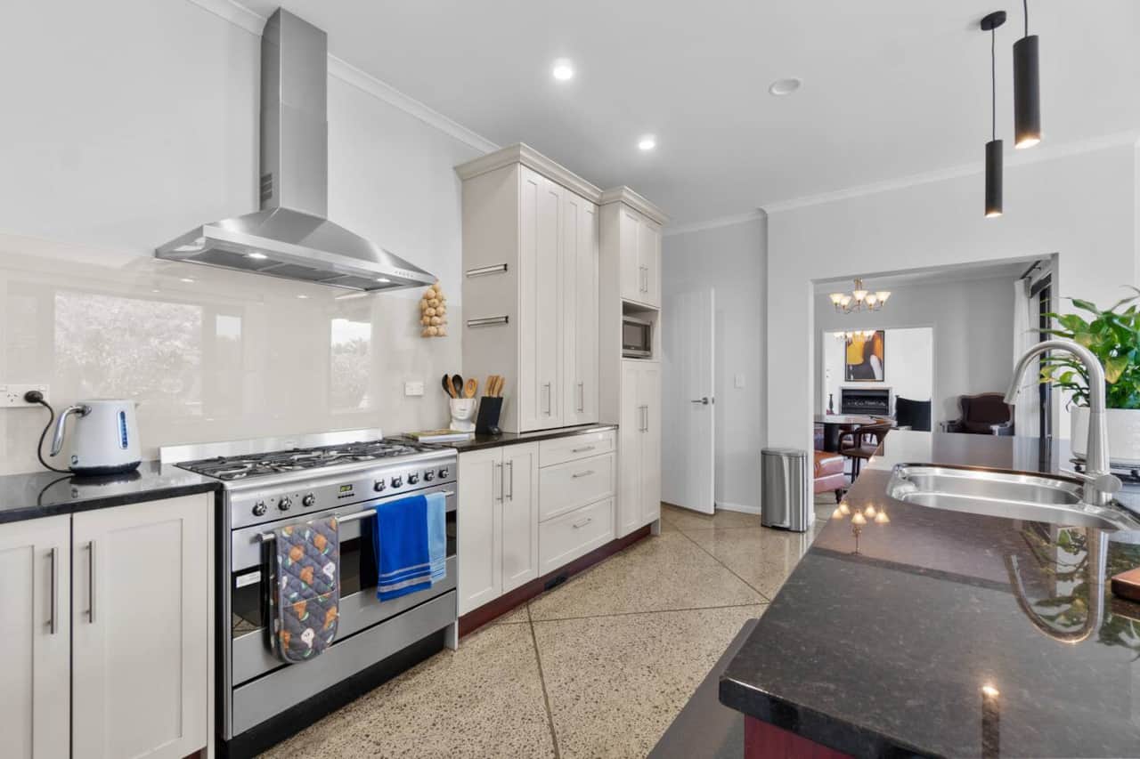 French Style kitchen with everything you need for a short or long stay including rice cooker, air fryer, sandwich press, toaster, kettle, baking trays and numerous cooking essentials.