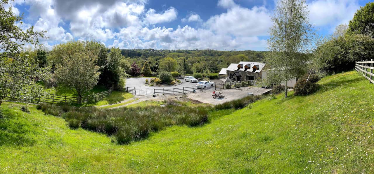 Aerial view of the cottage and courtyard grounds