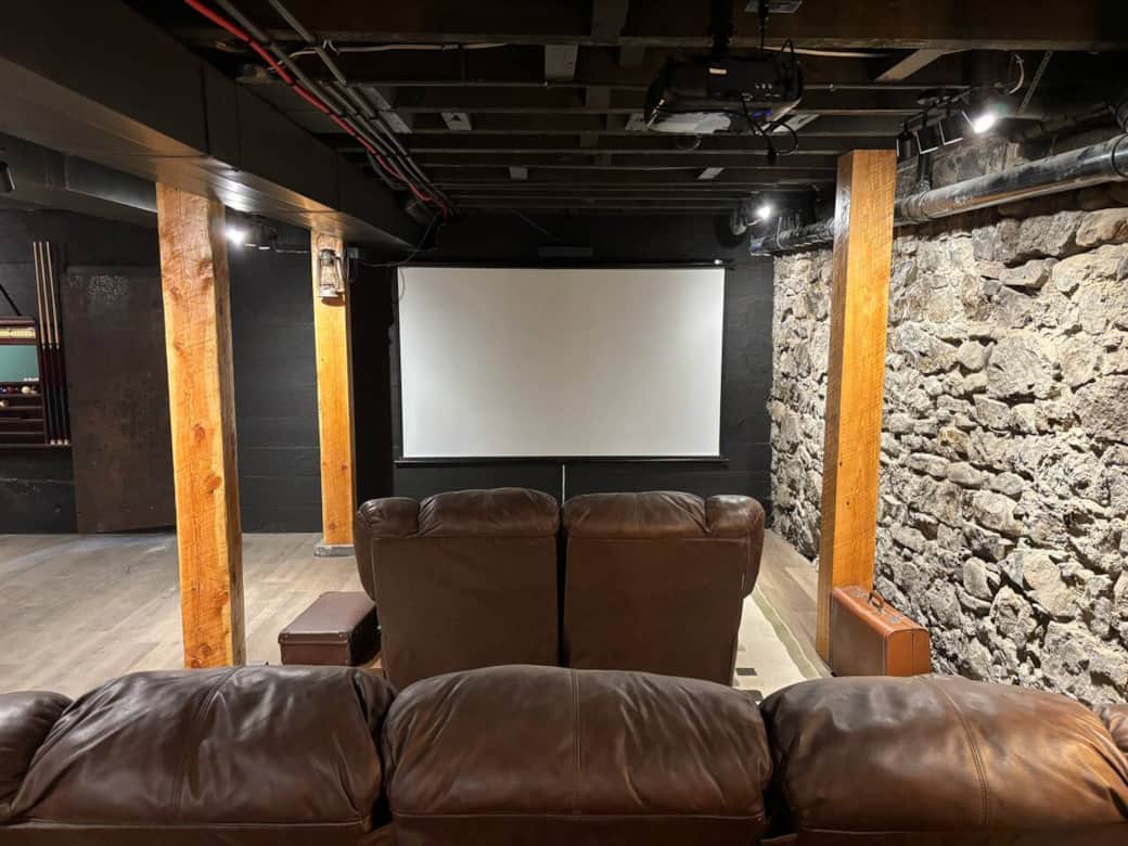 Have a movie night with reclining couchs, surround sound, and a 10-foot screen