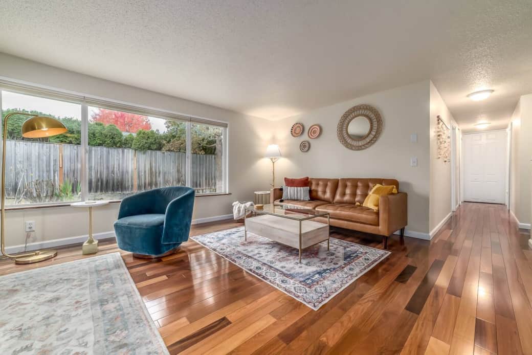 Living room with Leather sofa , coffee table and swivel chairs. Living room with Leather sofa , coffee table and swivel chairs.