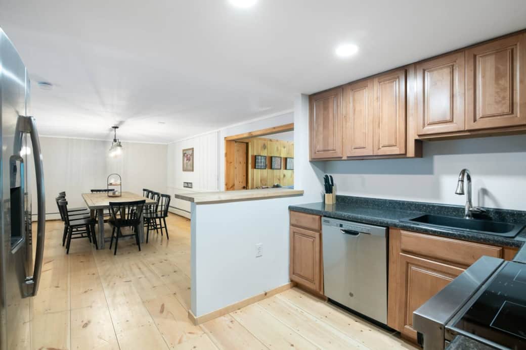 Unit 1 Kitchen opens up into the large dining area