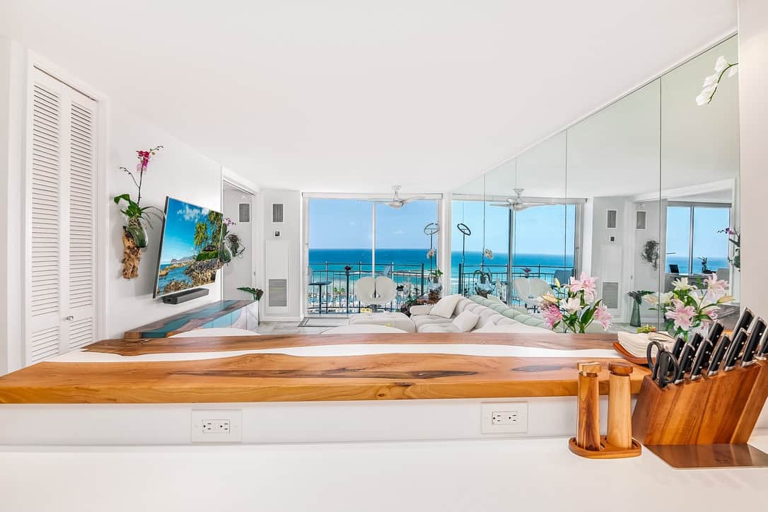 Enjoy panoramic views as you prepare refreshments in the open kitchen.