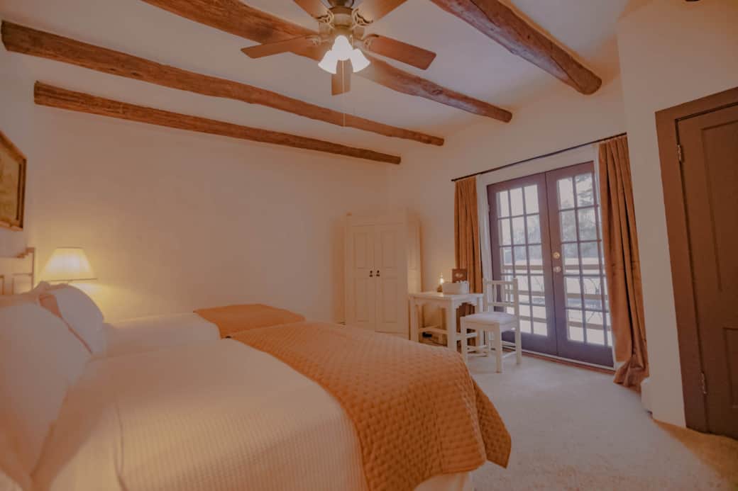 Desk and wardrobe for storage.