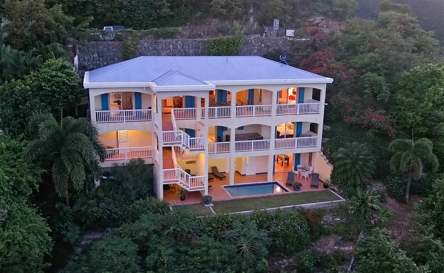 Three levels of living space nestled in the hills of Coral Bay