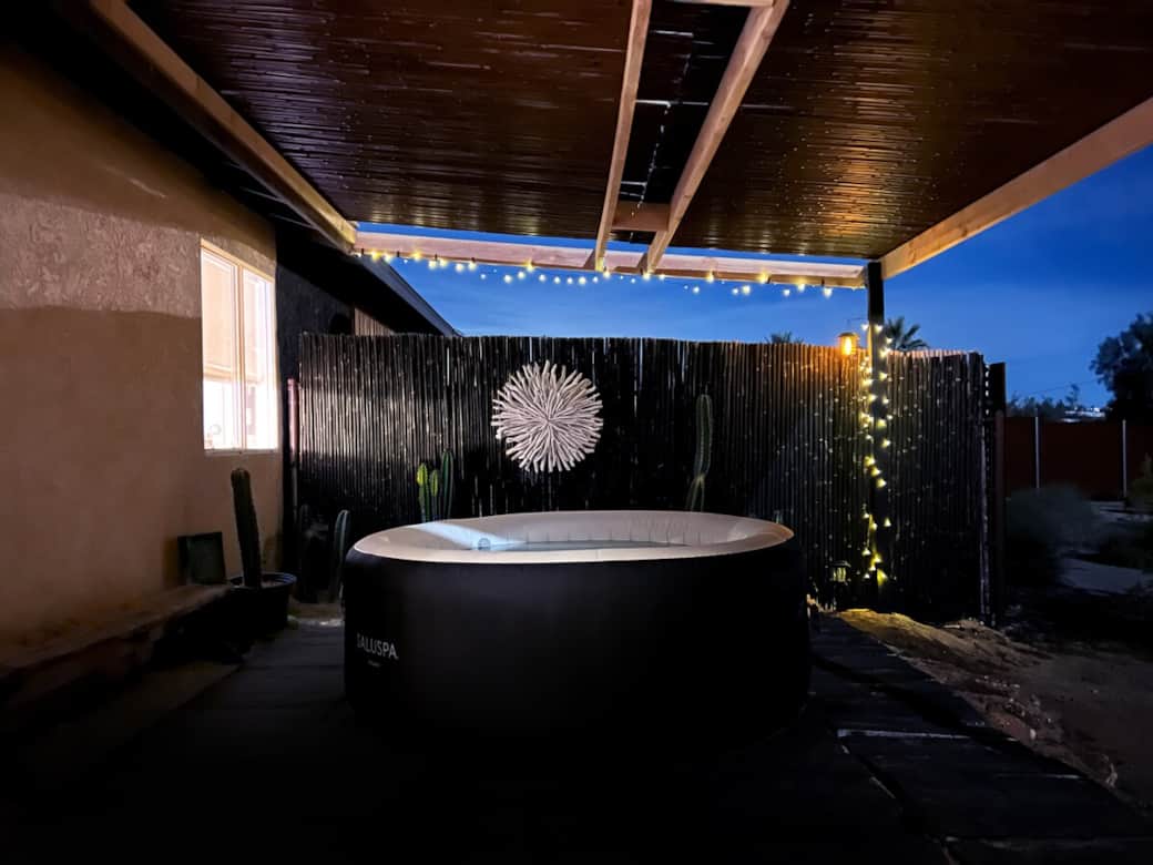 A quiet place to soak under soft lights and desert skies.
