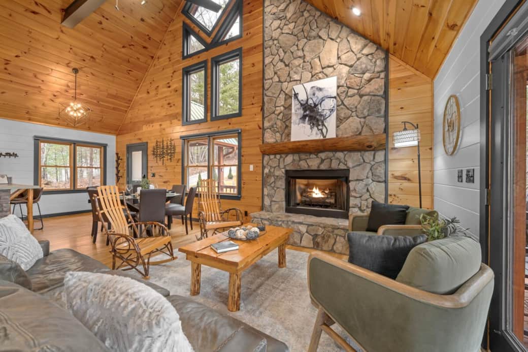 This open space concept creates a spacious area for everyone to get together. The main deck is accessible from here for spill-over seating.
