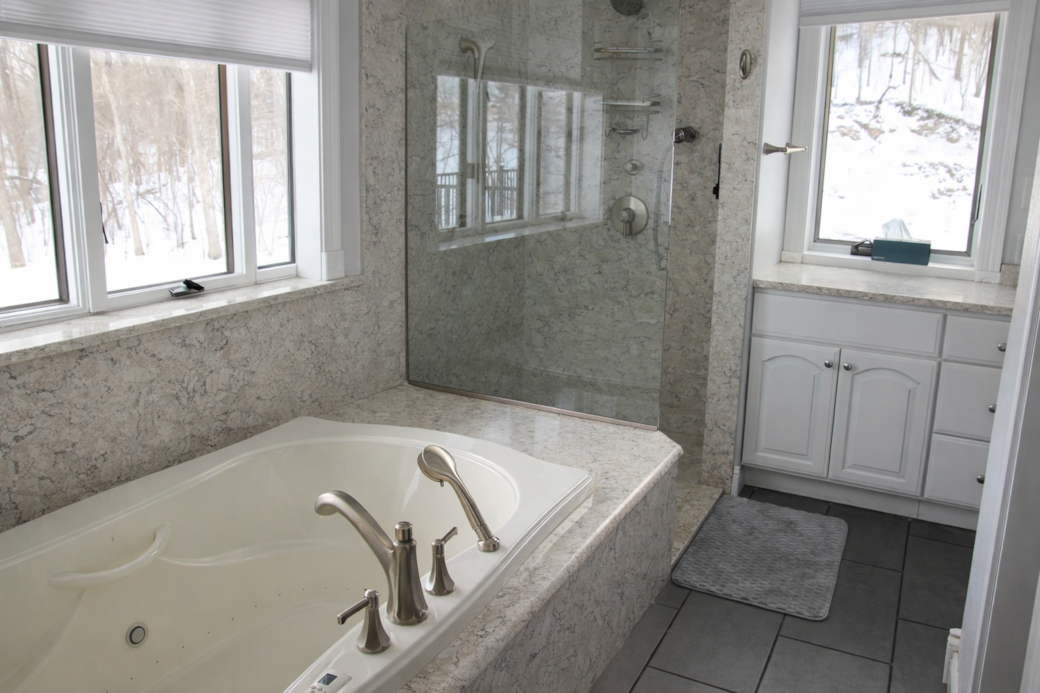 Primary bathroom with soaking tub and walk-in shower. Primary bathroom with soaking tub and walk-in shower.
