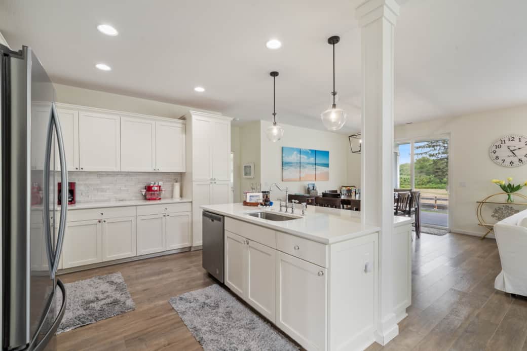 Mingle and relax in the open-concept kitchen, a layout that keeps everyone connected.
