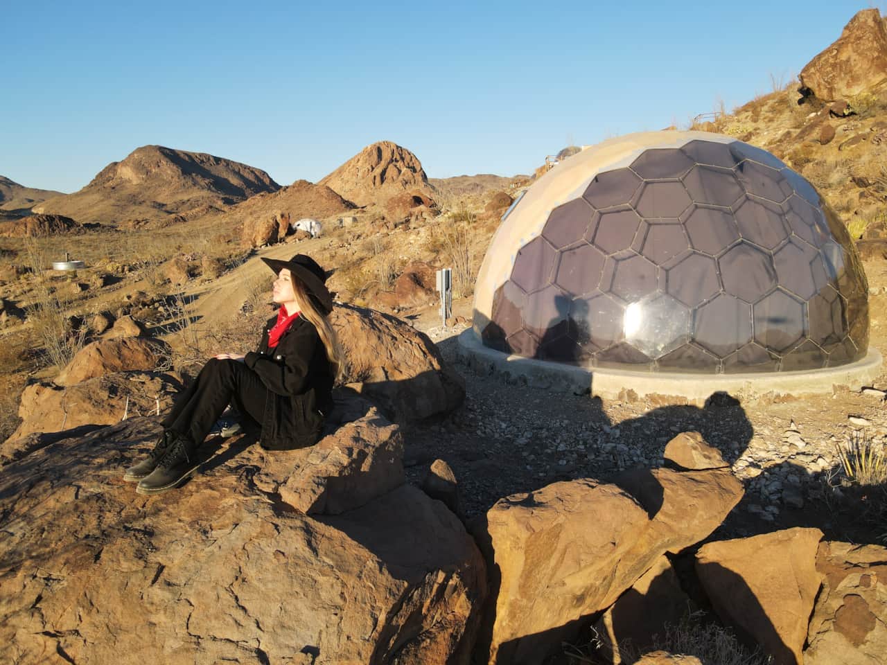 Aerial view of Space Pod 005 dome on the volcanic hill