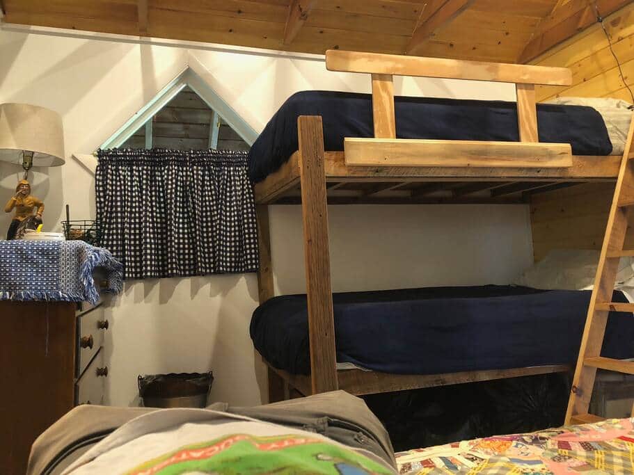 By the double beds there is a dresser and a nice ladder for accessing the top bunk By the double beds there is a dresser and a nice ladder for accessing the top bunk
