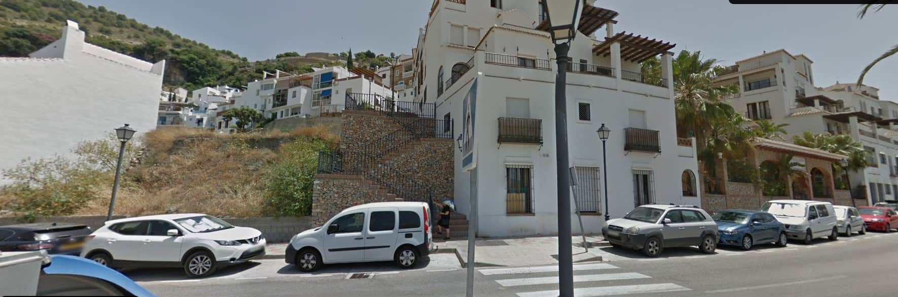 The stone stairway leading up from Avenida Carlos Cano toward Fuente Vieja.
