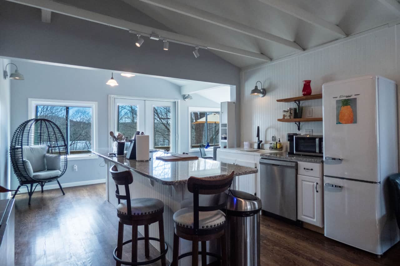 Fully stocked kitchen with sweeping views of the lake