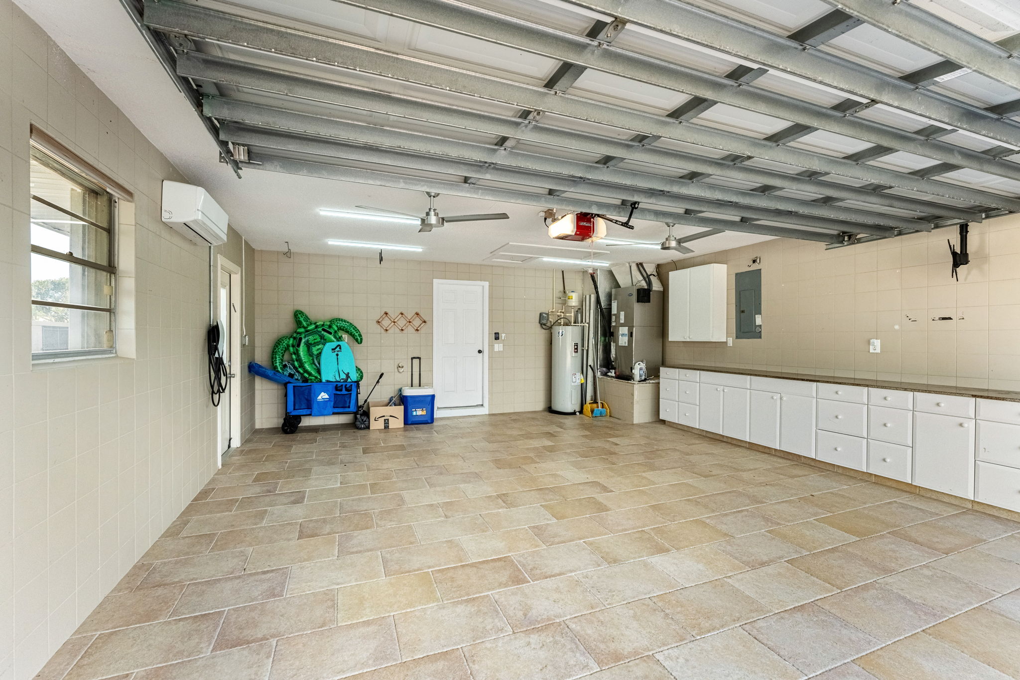 Ample space for storing your gear or extra equipment in a well-organized garage.