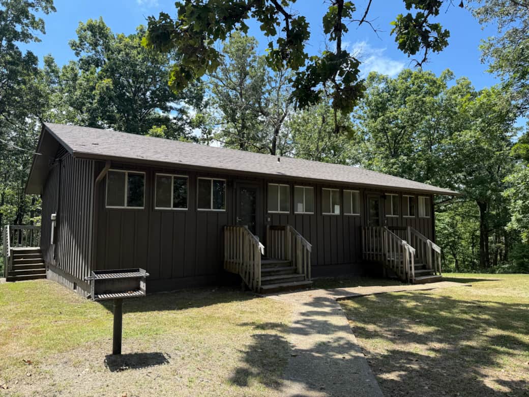 Cabin dining space with kitchen area at Buffalo Point near Buffalo River