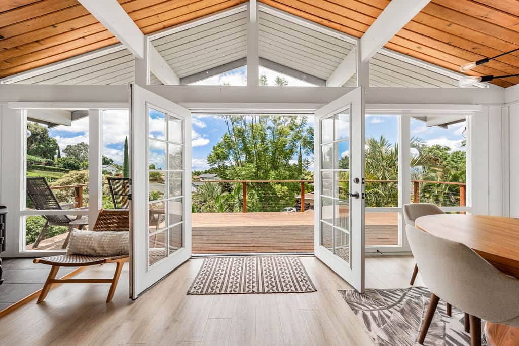 Double doors leading to large second story deck with views Double doors leading to large second story deck with views