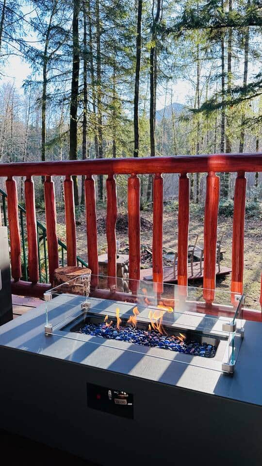 Enjoying the gas fire pit from the back deck 