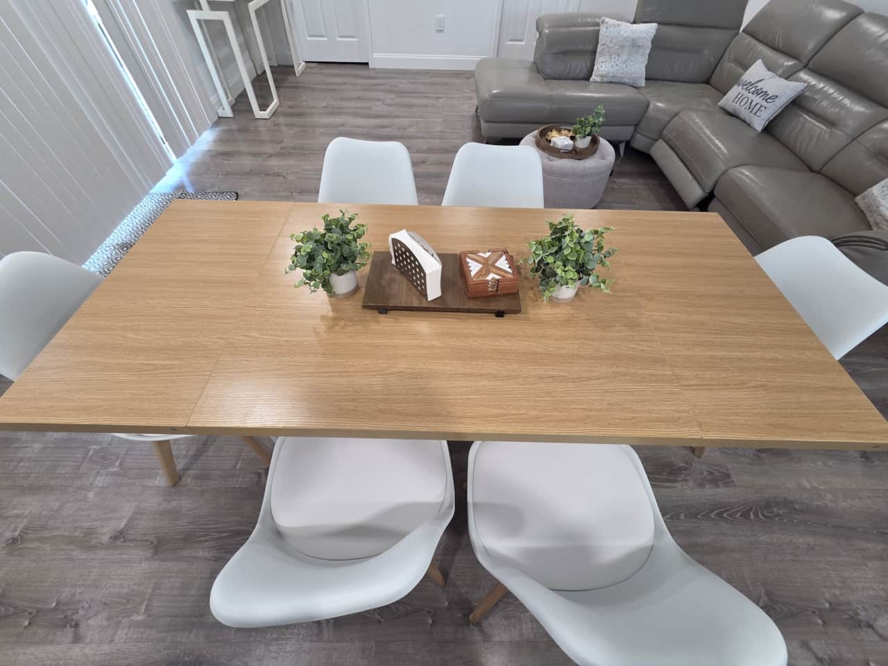 Modern dining table for 6 with stylish centerpiece. Lakeland, FL