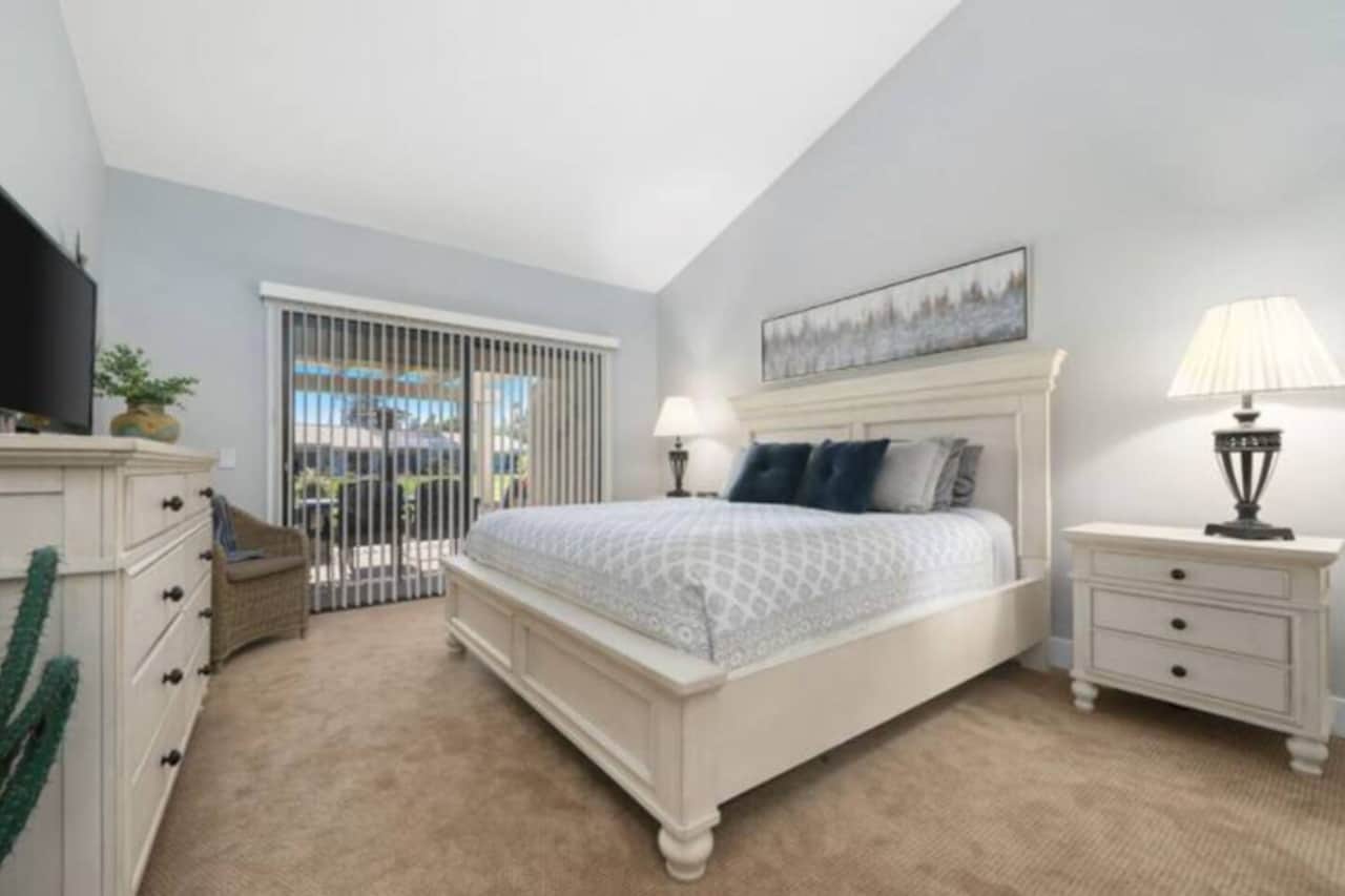 [Bedroom 2] King Bed with TV in Room, Easy Access Sliding Door to Patio.