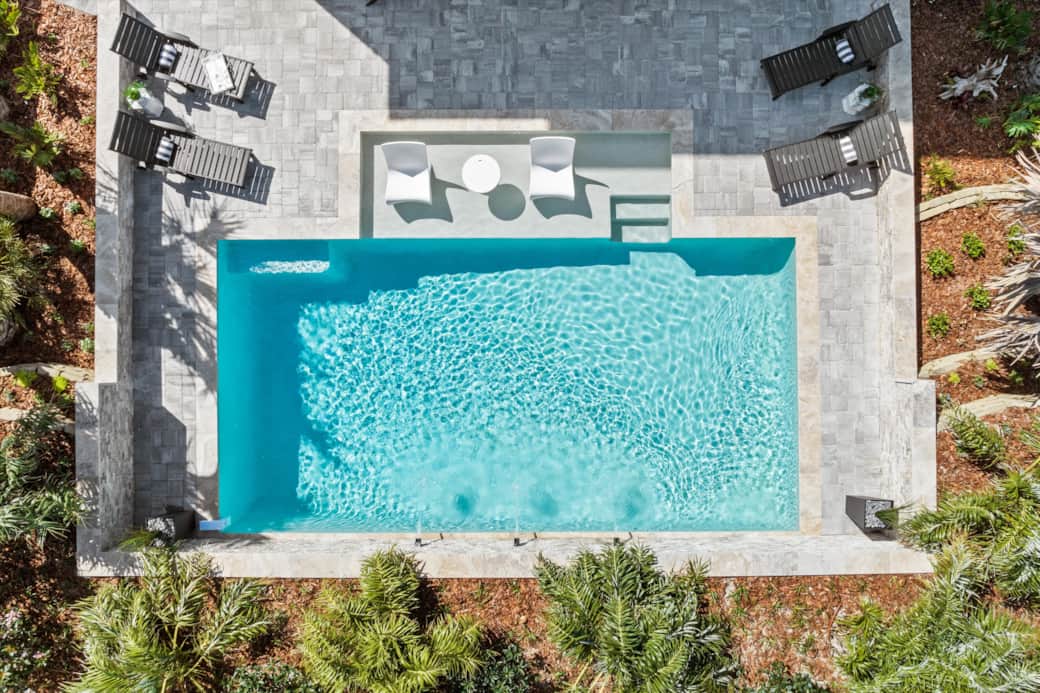 Your private pool awaits with ample seating for fun in the sun. Your private pool awaits with ample seating for fun in the sun.