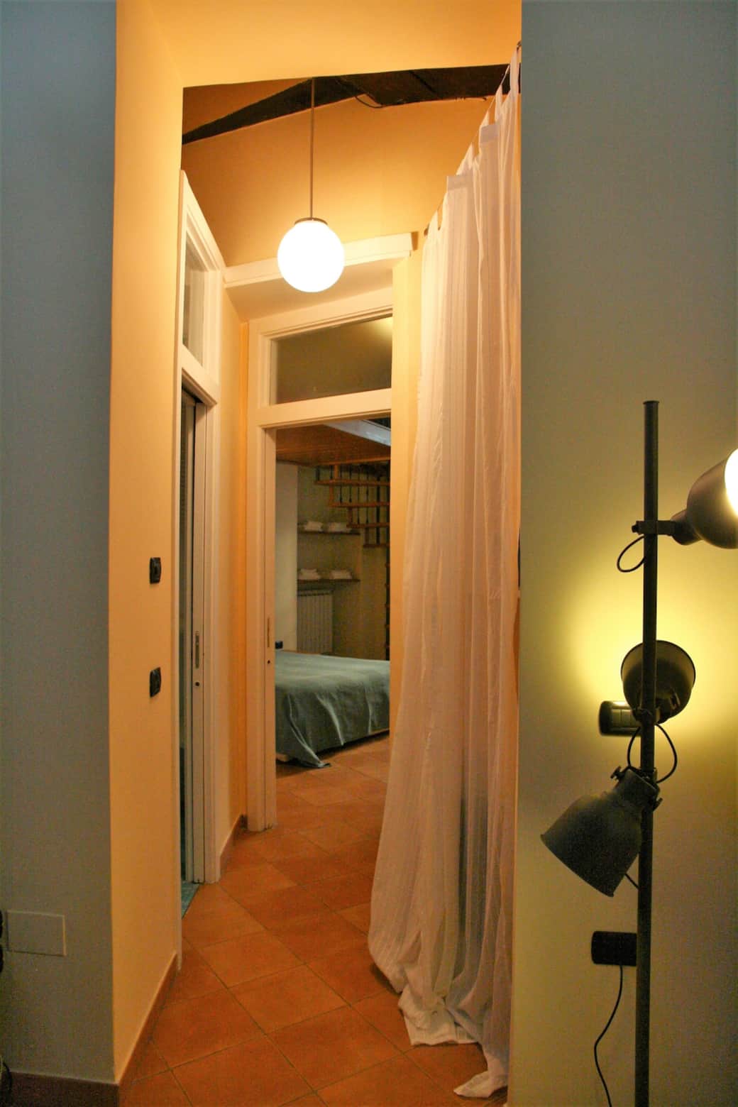 Small corridor between the living room and the main bedroom