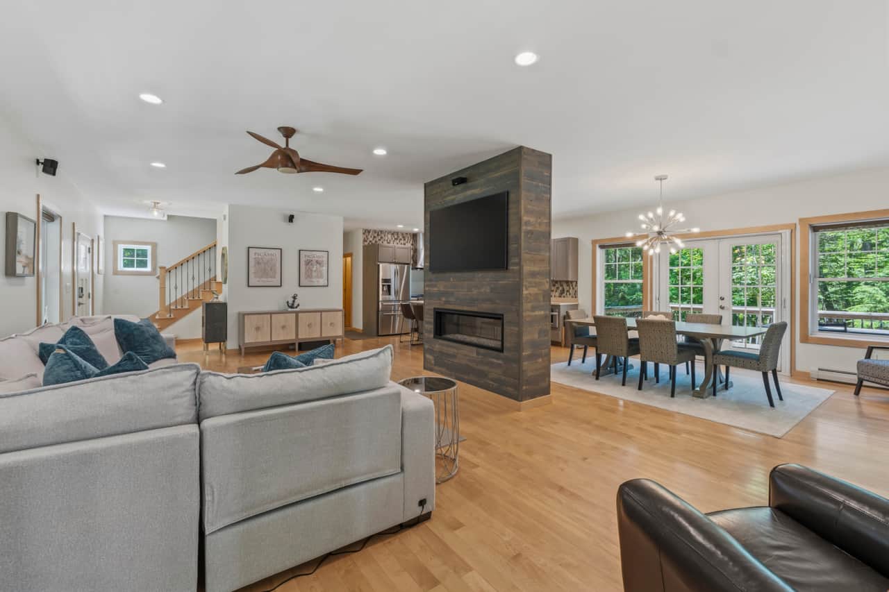 Living area anchored by double-facing fireplace